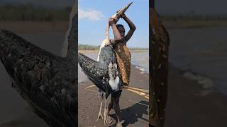 Hadzabe Bug Marabou Stork For Lunch Near Lake Eyasihadzabetribe shortsfeed [upl. by Langham]