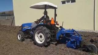 WORKMASTER 40 NEW HOLLAND BARBECHANDO ARADO 2 DISCOS [upl. by Cibis]