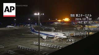 Video shows moment Japan plane crashes in Tokyo airport [upl. by Ellohcin]