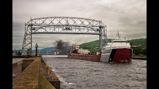 Arthur M Anderson kicks it in quotoverdrivequot as she passes under Duluths Aerial lift Bridge [upl. by Noman]