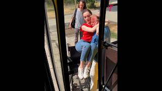 Bus driver carries paraplegic girl onto bus paralyzed girl lifting transferring [upl. by Eissak]