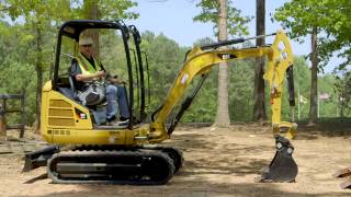 Cat® Mini Excavator Operating Tips Blade Positioning [upl. by Ennahs889]