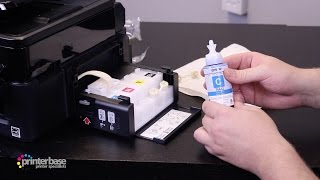 How to refill ink on Epson EcoTank Printers  printerbasecouk [upl. by Alboran176]