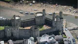 Caernarfon Castle Wales  Visit Britain  Unravel Travel TV [upl. by Anastasie]