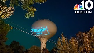 Town responds to Trump sign projected on Hanson water tower [upl. by Ayotas]