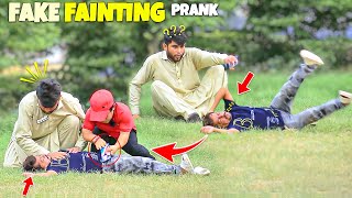 Fake Fainting Prank  Hillarious Reactions [upl. by Ynatirb907]