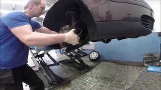 Volvo V50 Front Brake Discs and Pads Replacement [upl. by Julide591]