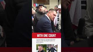 Tommy Robinson charged under Terrorism Act as he hands himself into police  LBC [upl. by Ard]