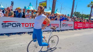 Mindblow Guarantee Bike Girl Performs Insane Bike Tricks on the Street at Cycling Race [upl. by Susejedesoj]