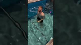 Lions star Aidan Hutchinson Begins Rehab with pool work [upl. by Ivens]