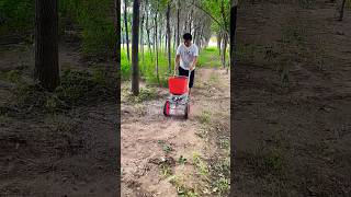 wheelbarrow fertilizer spreader agriculture rurallife agriculture [upl. by Audly]