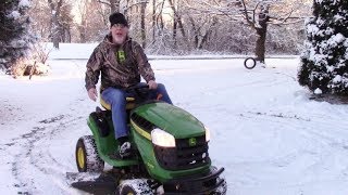 Mowing Snow with a John Deere D105 [upl. by Erdnaed]