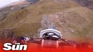 Dirt biker rides off 40ft cliff and survives Wales [upl. by Ydnyl]