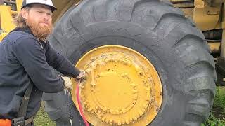 Reinflating a CAT 988 loader tire [upl. by Yeaton]