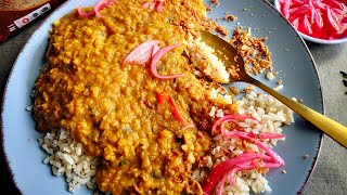 Dhal curry with brown Spekko rice served with pickled red onion and crispy fried onion [upl. by Ricarda]