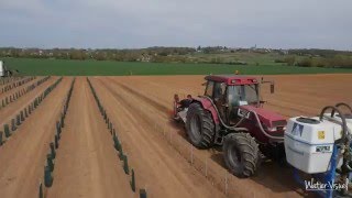 Plantation mécanique vigne machineplanteuseplants viticolesguidage laser [upl. by Nevart575]