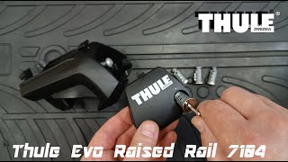 How to remove and replace a Thule Evo Raised Rail 7104 Foot Pack lock [upl. by Attenra402]