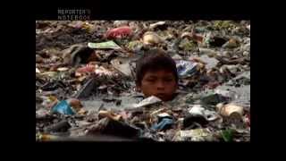 Reporters Notebook Kids wade in garbagefilled water for a living Burak at Pangarap [upl. by Yliram]