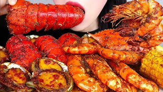 Asmr seafood boil mukbang lobster tail shirmp carb abalone sausage corn potatoes eattting sound [upl. by Maggie955]