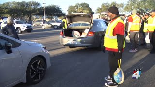 Thousands wait for hours to get Thanksgiving supplies in Downtown Jacksonville [upl. by Suiraj738]