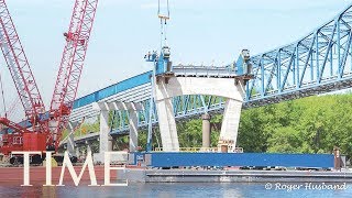 Watch The SavannaSabula Bridge Implode Over The Mississippi River Due To Safety Issues  TIME [upl. by Josy]