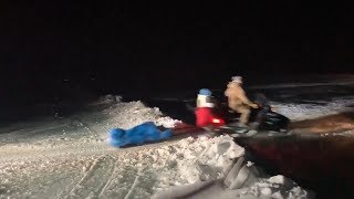 Snowmobiles jump over crack in Saginaw Bay ice [upl. by Anwaf245]