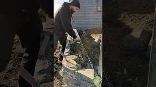 Completing a Blue Stone retaining wall canberra stonemason masonry landscaping [upl. by Suravat]