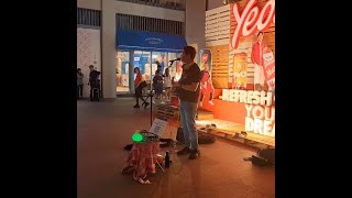 Busker Apelles Sings 海阔天空 at One Holland Village [upl. by Reinhardt]