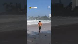 Giant Waves Crash Over Crowds at Hawaii Surf Event [upl. by Bobina163]