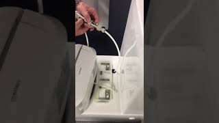 Removing a USPA Bidet Seat from the toilet pan [upl. by Akimas]