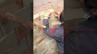 Masonry process of white bricks on the well wall [upl. by Dennis]