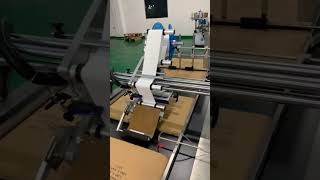 Carton labeling machine automatic page labeling size carton sticker labels are universal [upl. by Nolaf987]