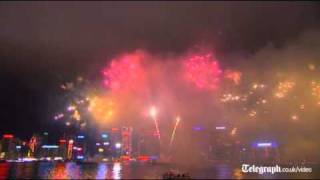 Hong Kong welcomes the Year of the Dragon with a Chinese New Year fireworks [upl. by Atalee566]