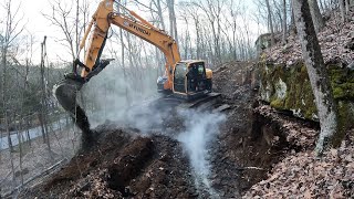 Digging in a driveway with a new excavator [upl. by Eneles676]