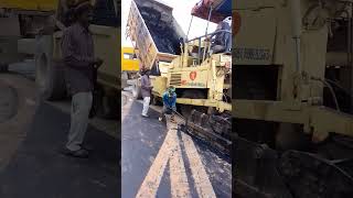 Dense bituminous Macadam DBMlaying in Gwalior Airport Car parking road with Paver Machine [upl. by Ahsael65]