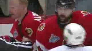 Daniel Alfredsson shoots the puck on Niedermayer [upl. by Ydnis]