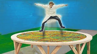 UN TRAMPOLINE AVEC 15 000 ÉLASTIQUE [upl. by Lewan671]