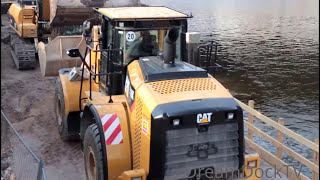 Caterpillar 319D crawler excavator loading CATERPILLAR 950K wheel loader with dirt on jobsite [upl. by Alih208]