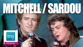 Eddy Mitchell et Michel Sardou quotNoël blancquot  Archive INA [upl. by Arteid]