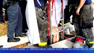 Naked Woman Rescued From Storm Drain In Delray Beach [upl. by Atterys]