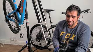 How to change the travel on a rockshox yarilyrik [upl. by Ettenhoj]