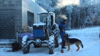 Starting an air cooled tractor in winter Featuring T40AM Russian tractor [upl. by Baird]