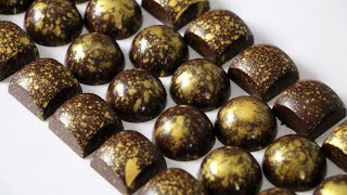 Chocolate Molds  How to Fill and Unmold Chocolates  Gold Fall Bon Bon Design [upl. by Refanej888]