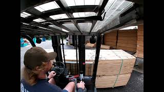 Forklift POV Unloading a Truck of Lumber [upl. by Nash]