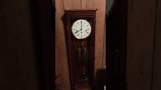 Howard Miller Wall Clock chiming the hour [upl. by Ybanrab]