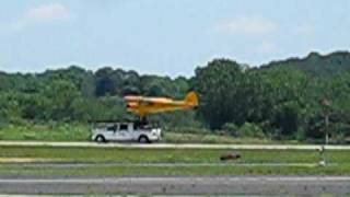 Piper Cub landing on moving pickup truck [upl. by Nuahsyt708]