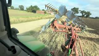 Ploughing with the 6R250 and KV 6 furrow plough [upl. by Aetnahc480]