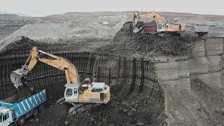 Two Liebherr 974 Excavators Loading Trucks  Aerial View  Ascon Ltd [upl. by Irmgard]