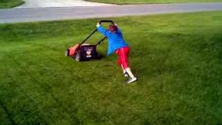 My 5 year old mowing with battery powered Black amp Decker lawn mower [upl. by Nylecsoj]