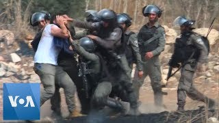 Palestinians Protesting Jewish Settlements Clash with Israeli Forces in West Bank  VOANews [upl. by Xuerd]